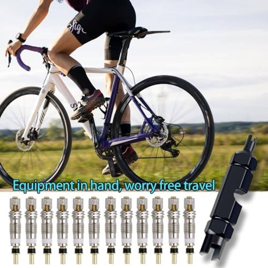 Road bike with presta valve core removal tool and multiple valve cores set