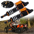 Pair of air shock absorbers with black coil springs and orange-gold damper cylinders