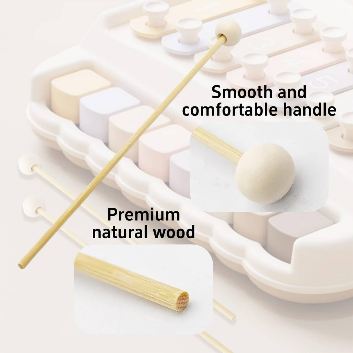Wood percussion mallet with smooth natural handle and round white striking head