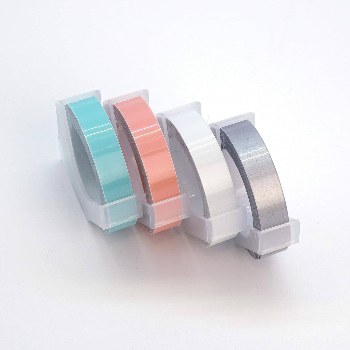 Embossing label maker refill tape rolls in pastel colors with clear cartridge holders