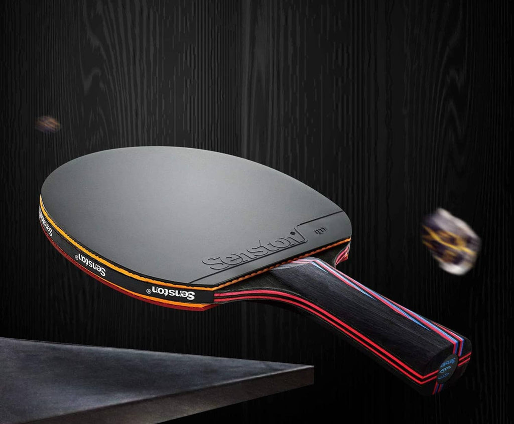 Table tennis paddle with gray playing face and red-black handle
