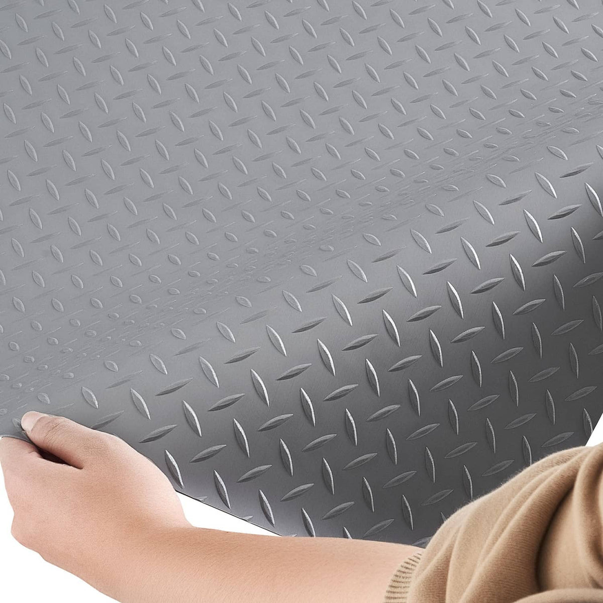 Silver gray garage floor mat with diamond-plate non-slip texture