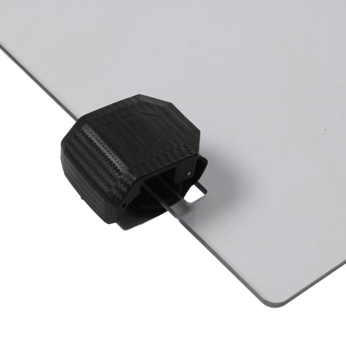 Front windshield hinge bracket with textured black housing attached to clear panel edge.