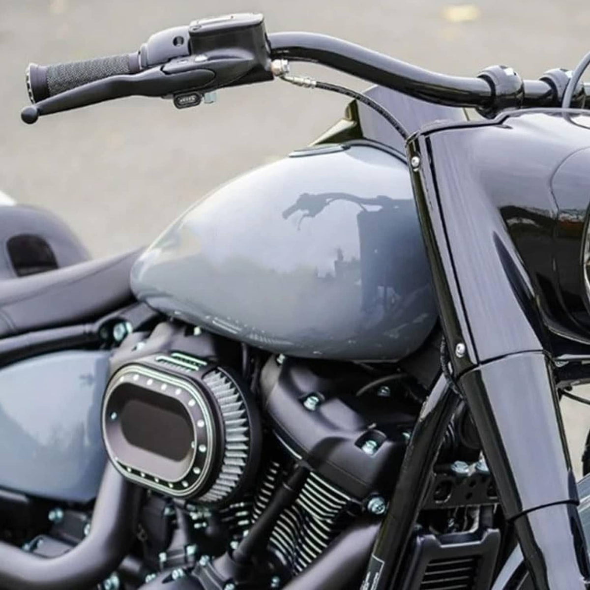 Motorcycle handlebar view with brake and clutch hand levers and textured grips