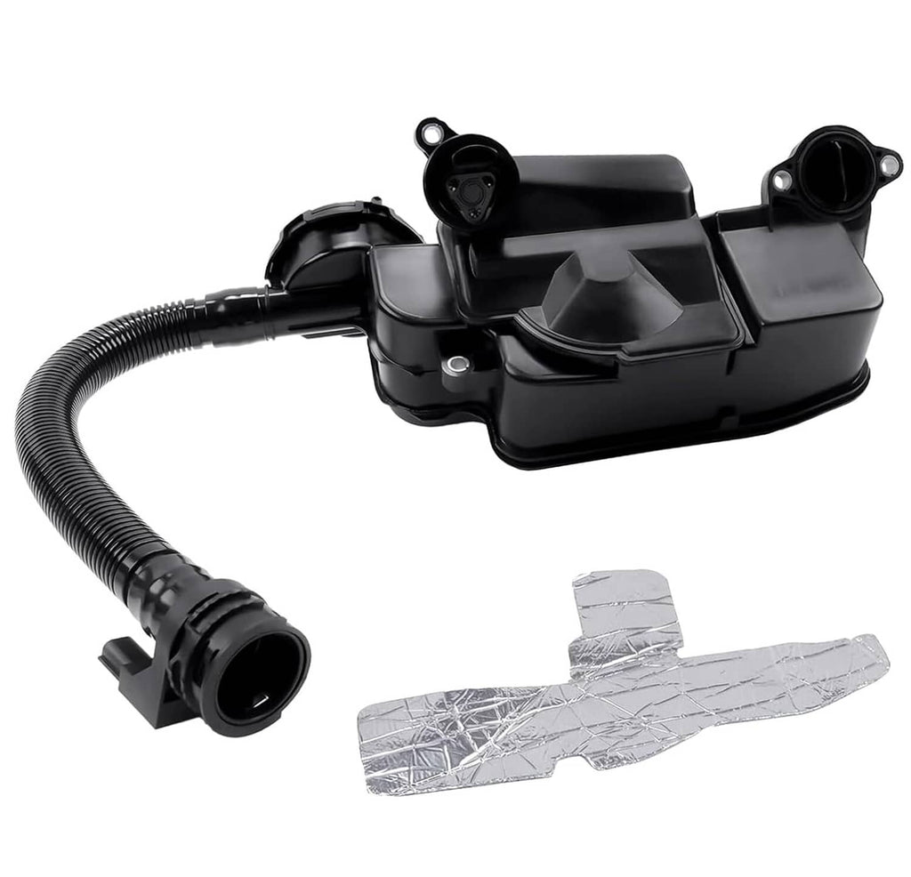 Black oil separator assembly close-up with hose ports and connector ends