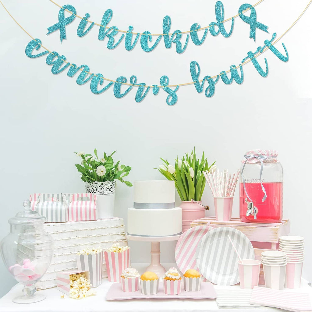 Sky blue glitter banner with 'Kick cancer' script and golden cord ribbon ties