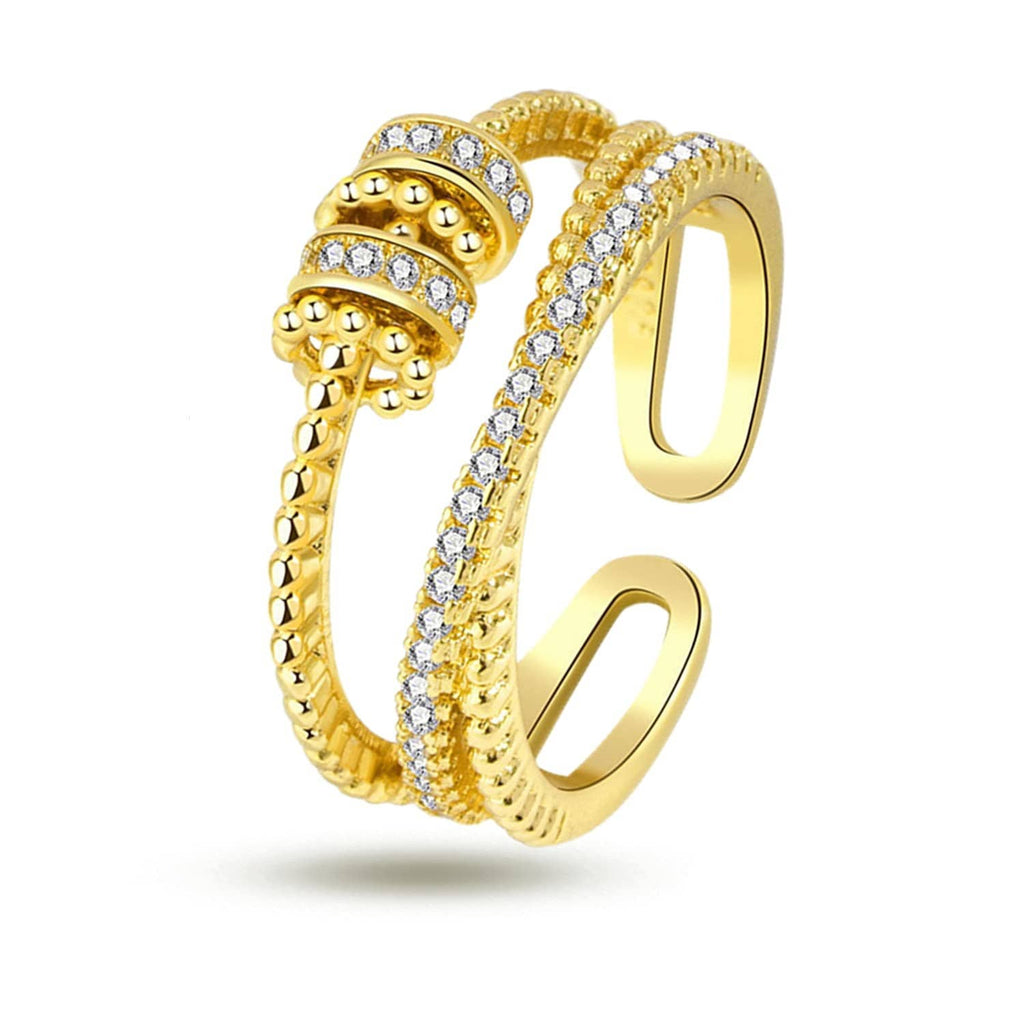 Gold-tone fidget ring with textured bead detailing and clear cubic zirconia bands