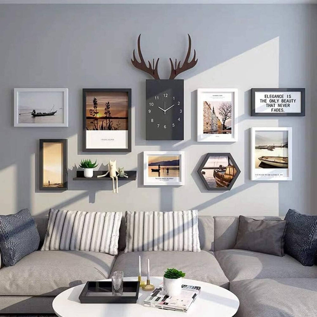 Living room wall display with multiple framed photos and decor mounted for adhesive use
