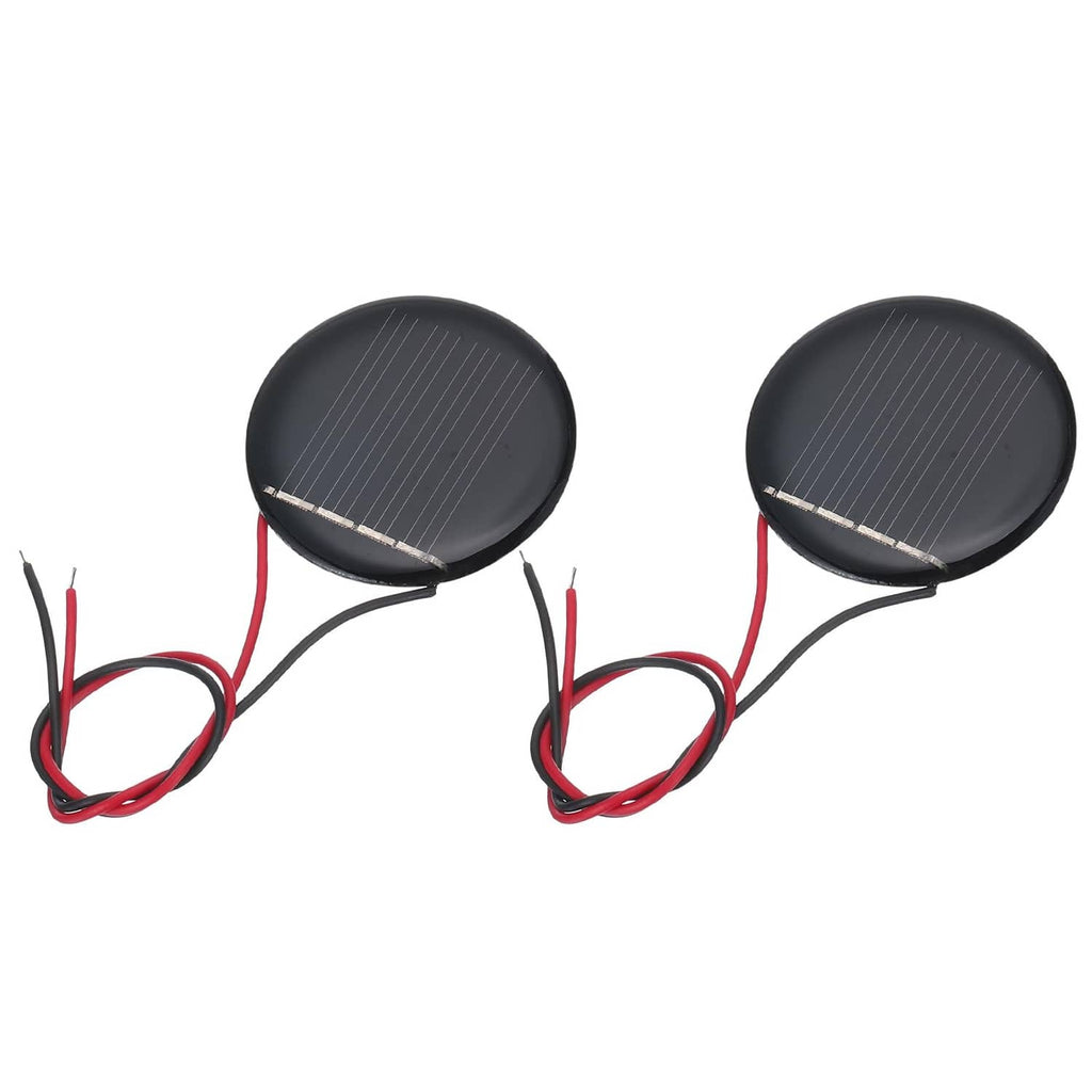 Two mini round black solar panels with red and black wiring leads