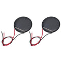Two mini round black solar panels with red and black wiring leads