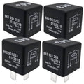 Black 4-pin automotive relay with white markings and two visible plug terminals