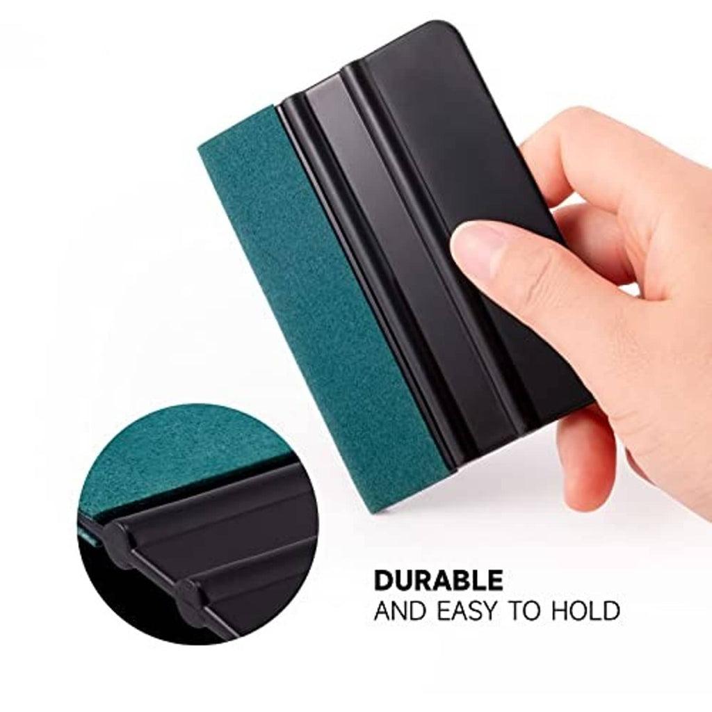 Compact vinyl wrap squeegee with black handle and teal felt suede pad, close-up corner.