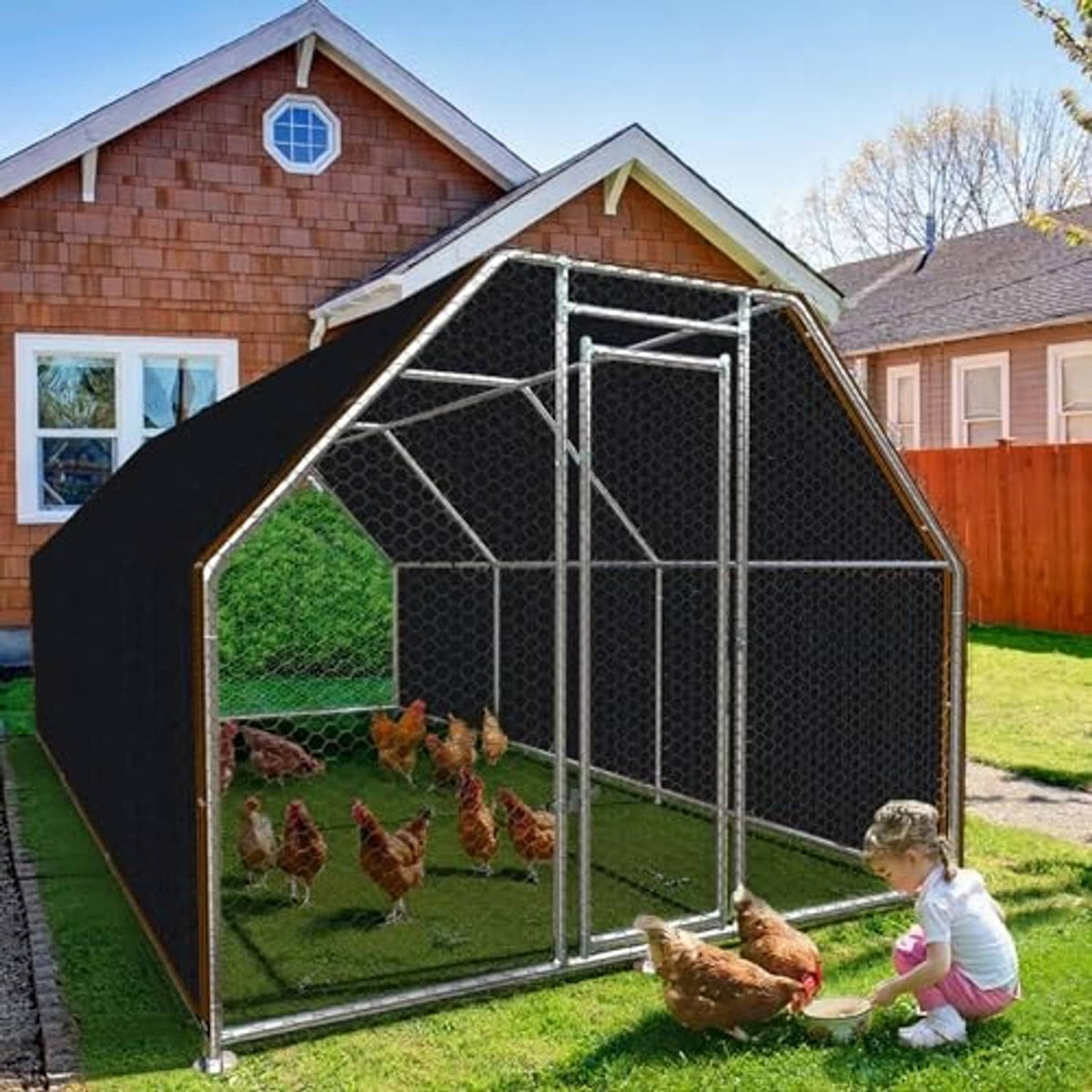 Black mesh shade cloth attached over a backyard chicken enclosure and run frame.