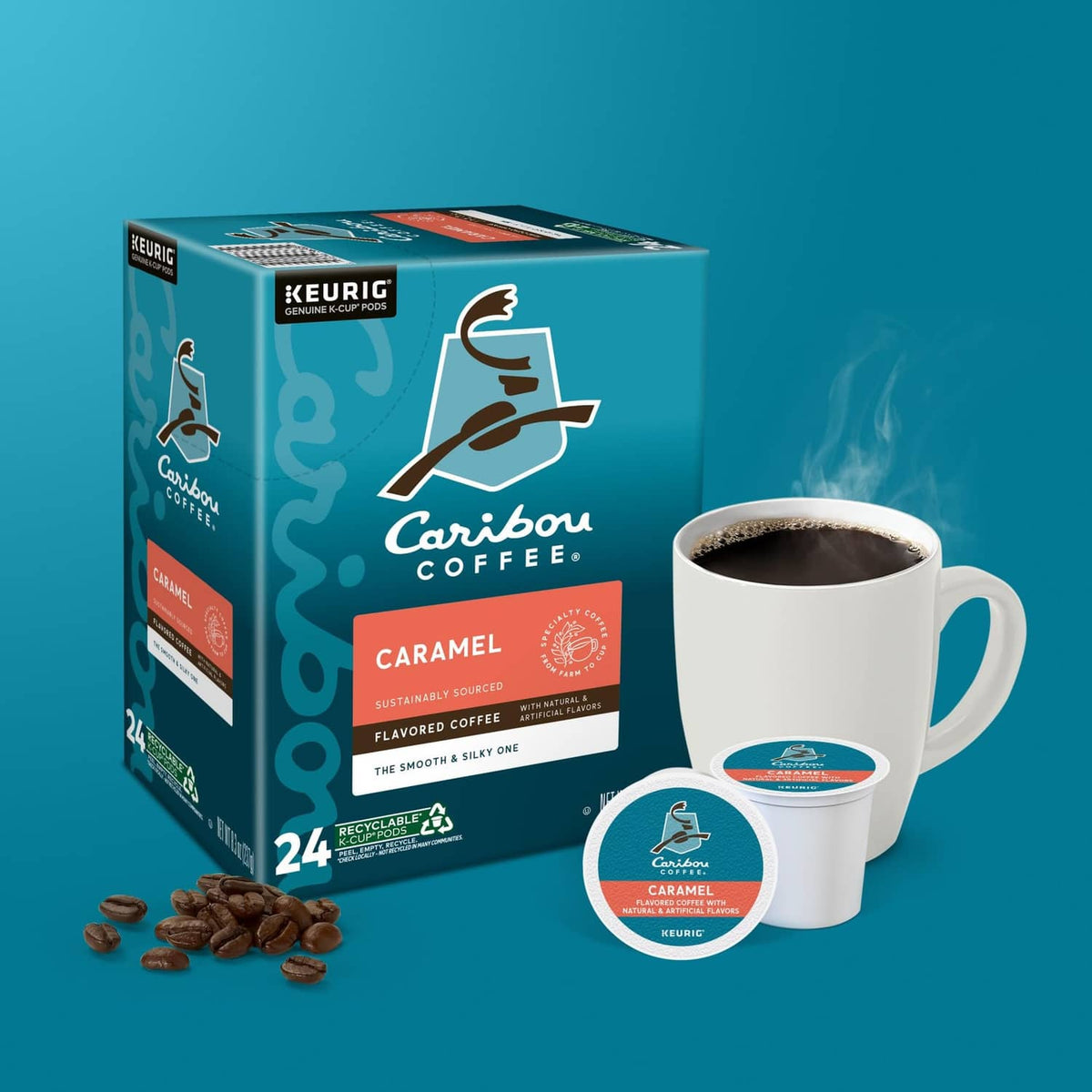 Caramel flavored K-Cup coffee box with brewed cup and loose pods on table
