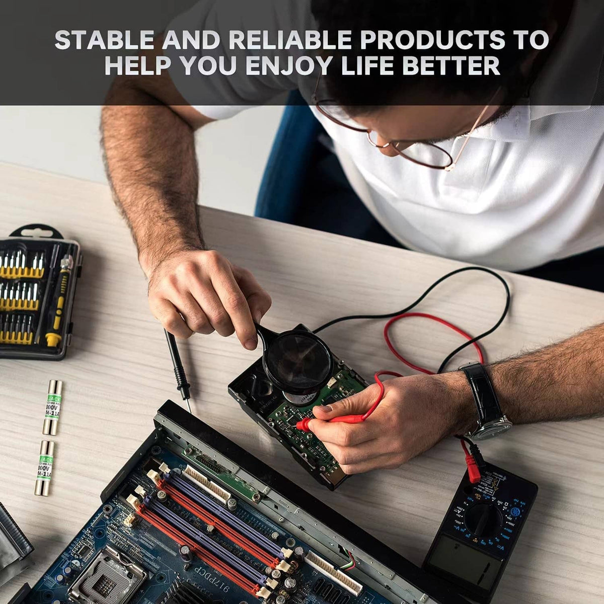 Technician holding replacement multimeter fuse while working on an electronic board
