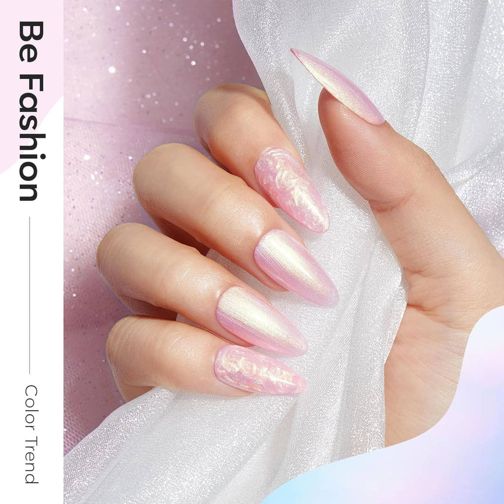 Close-up of long iridescent gel nails with pearl white and soft pink shimmer