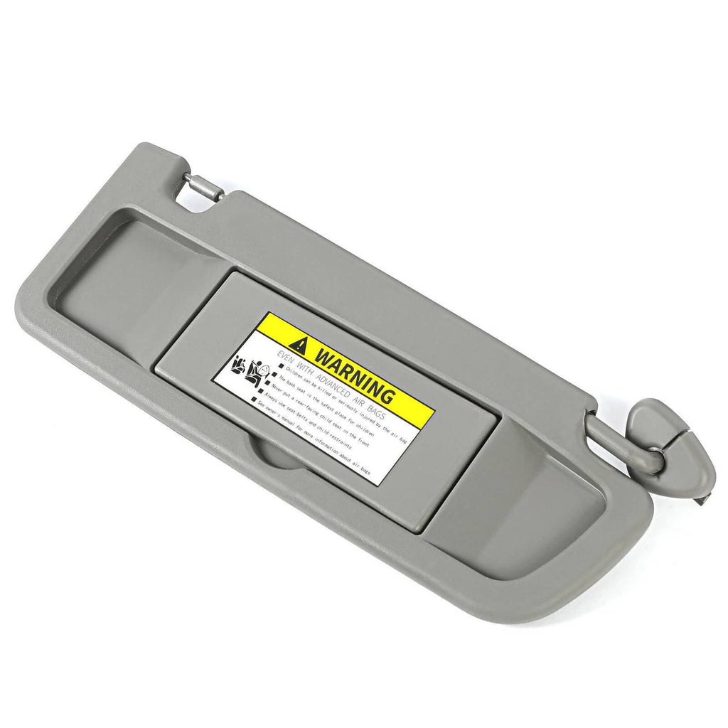 Gray sun visor angled view with warning label panel and pivot arm.