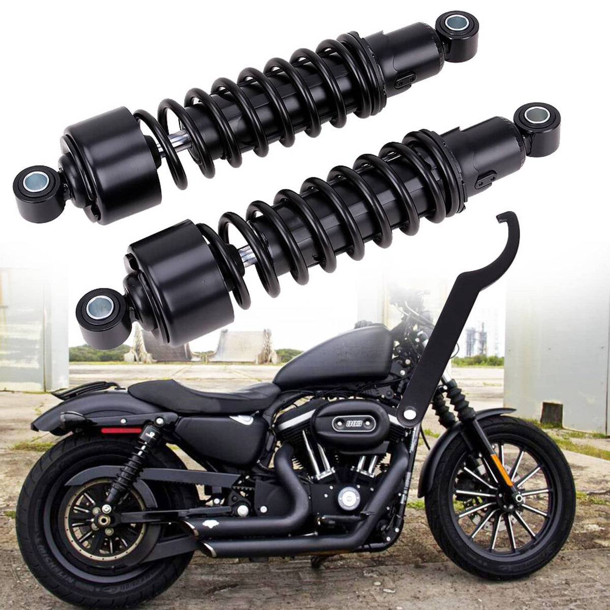 Pair of black rear suspension shocks mounted on a motorcycle, showing coil springs