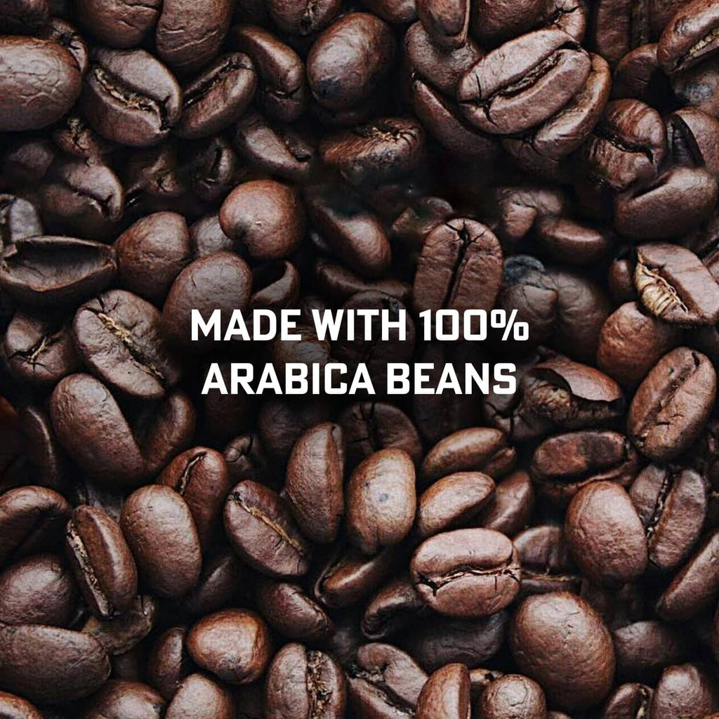 Whole coffee beans, dark roasted coffee beans filling the frame