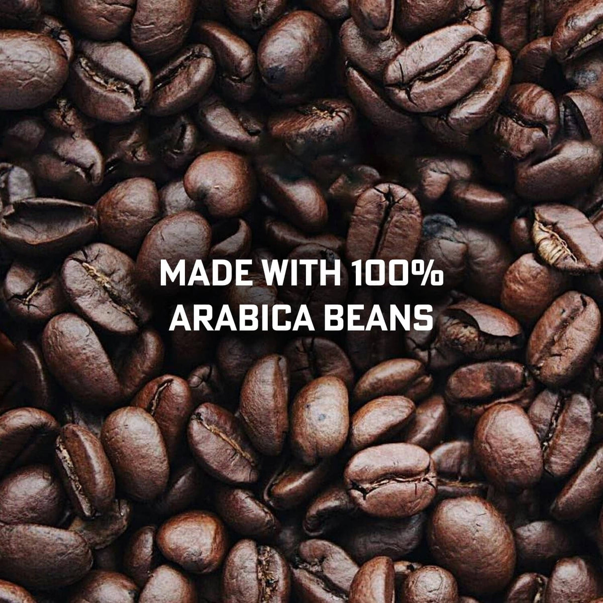 Whole coffee beans, dark roasted coffee beans filling the frame