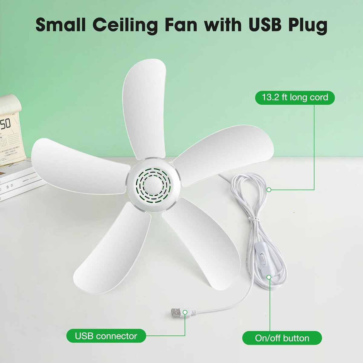 Portable USB ceiling fan with five white blades, green center motor, and USB cord details