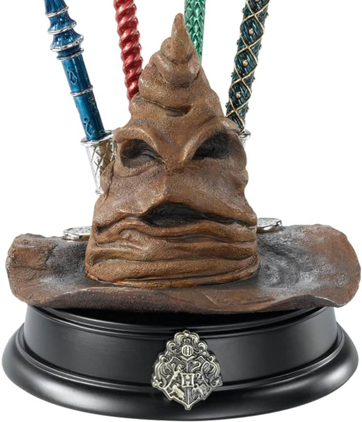 Sorting hat pen holder with detailed hat face, four colored wands, black base crest