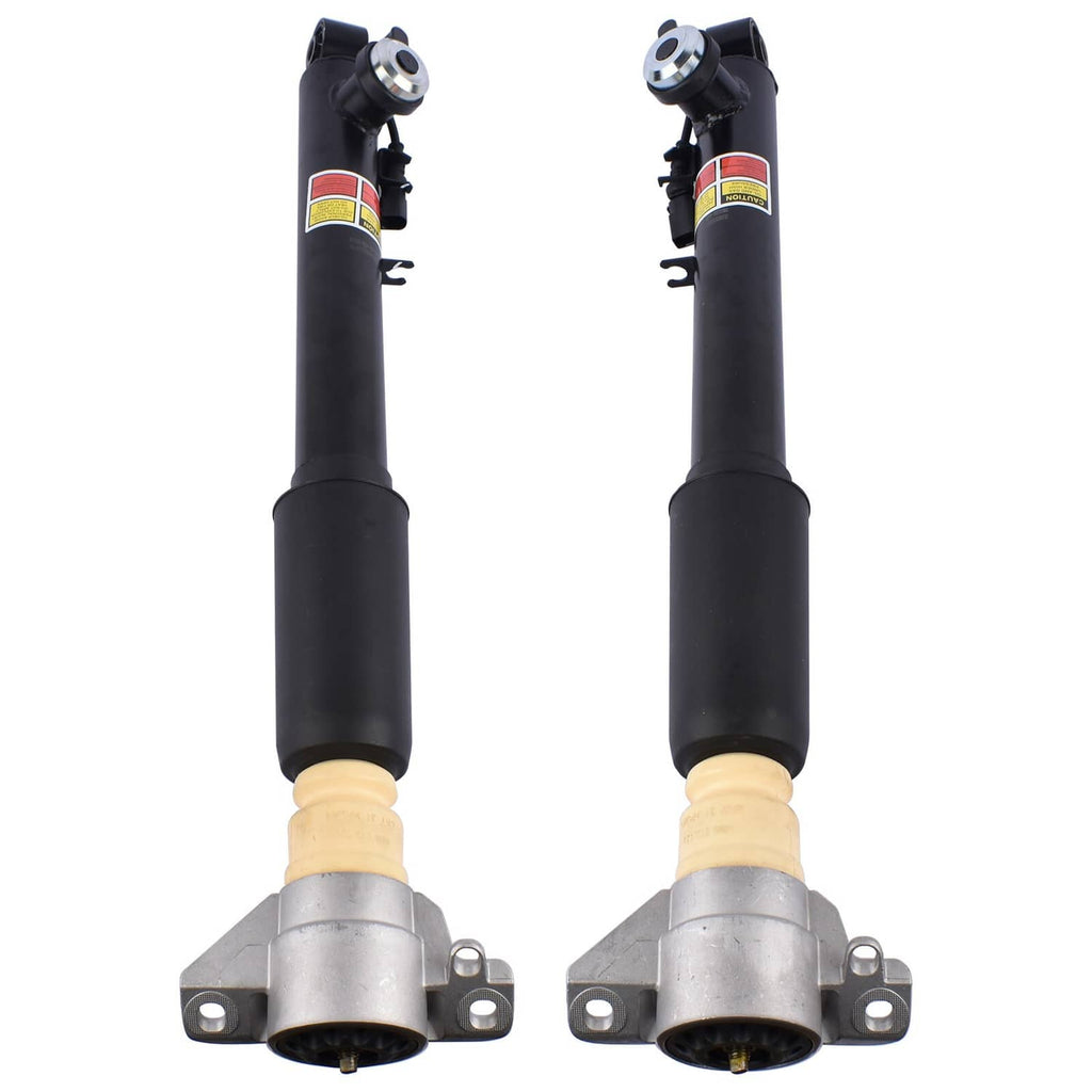 Set of two black electronic shock strut assemblies with mounting brackets and rubber dust boots