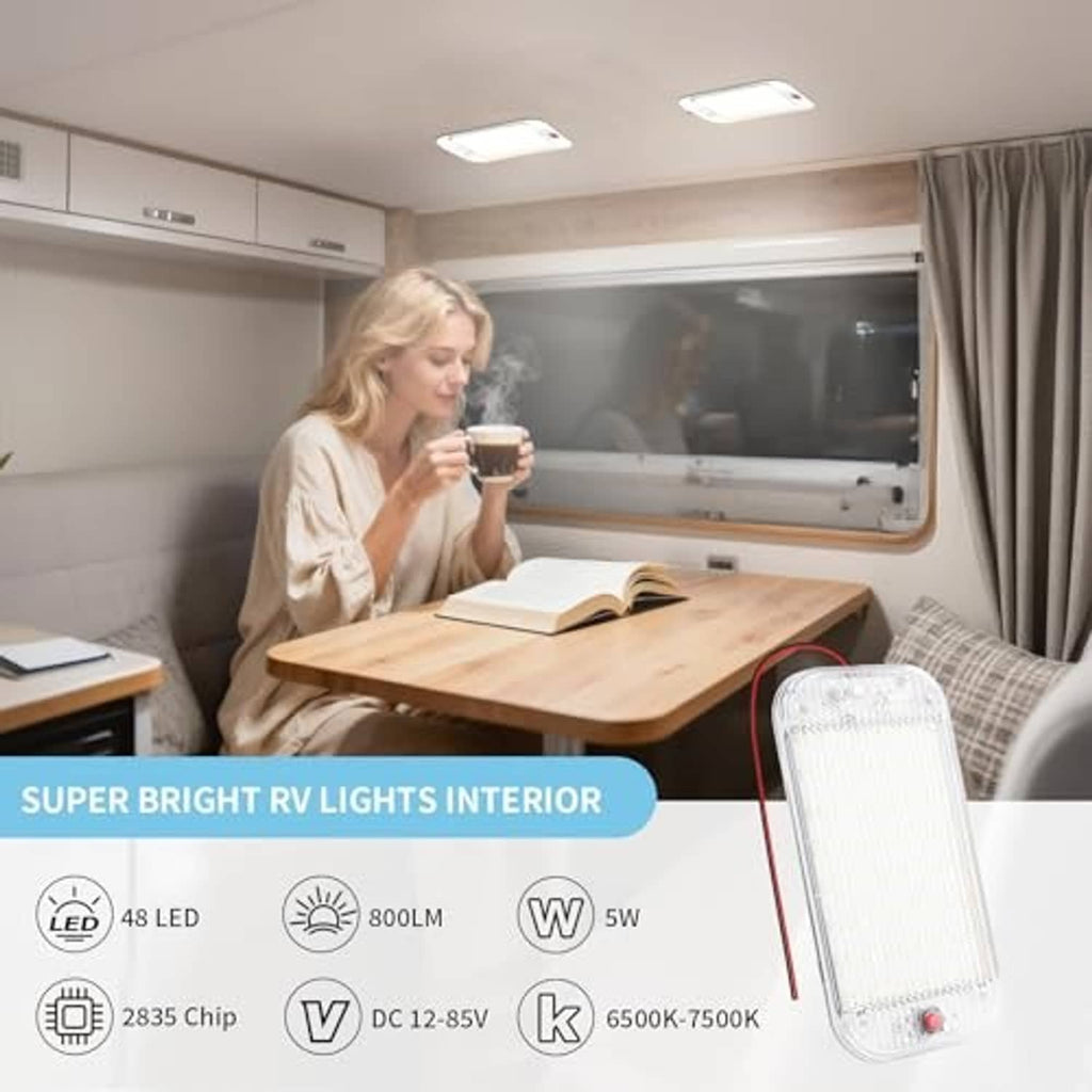 RV dome light glowing inside an RV interior, clear lens with red control button