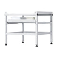 White metal laundry machine base stand with dual trays and adjustable leveling feet