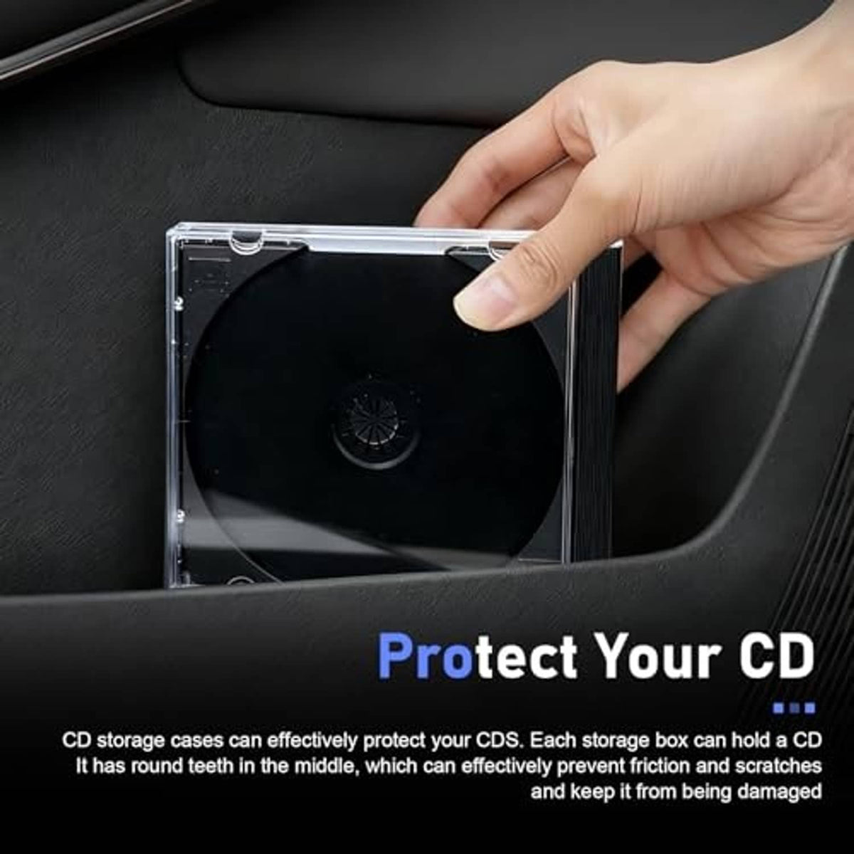 Hand holding a clear CD jewel case with dark disc against a surface