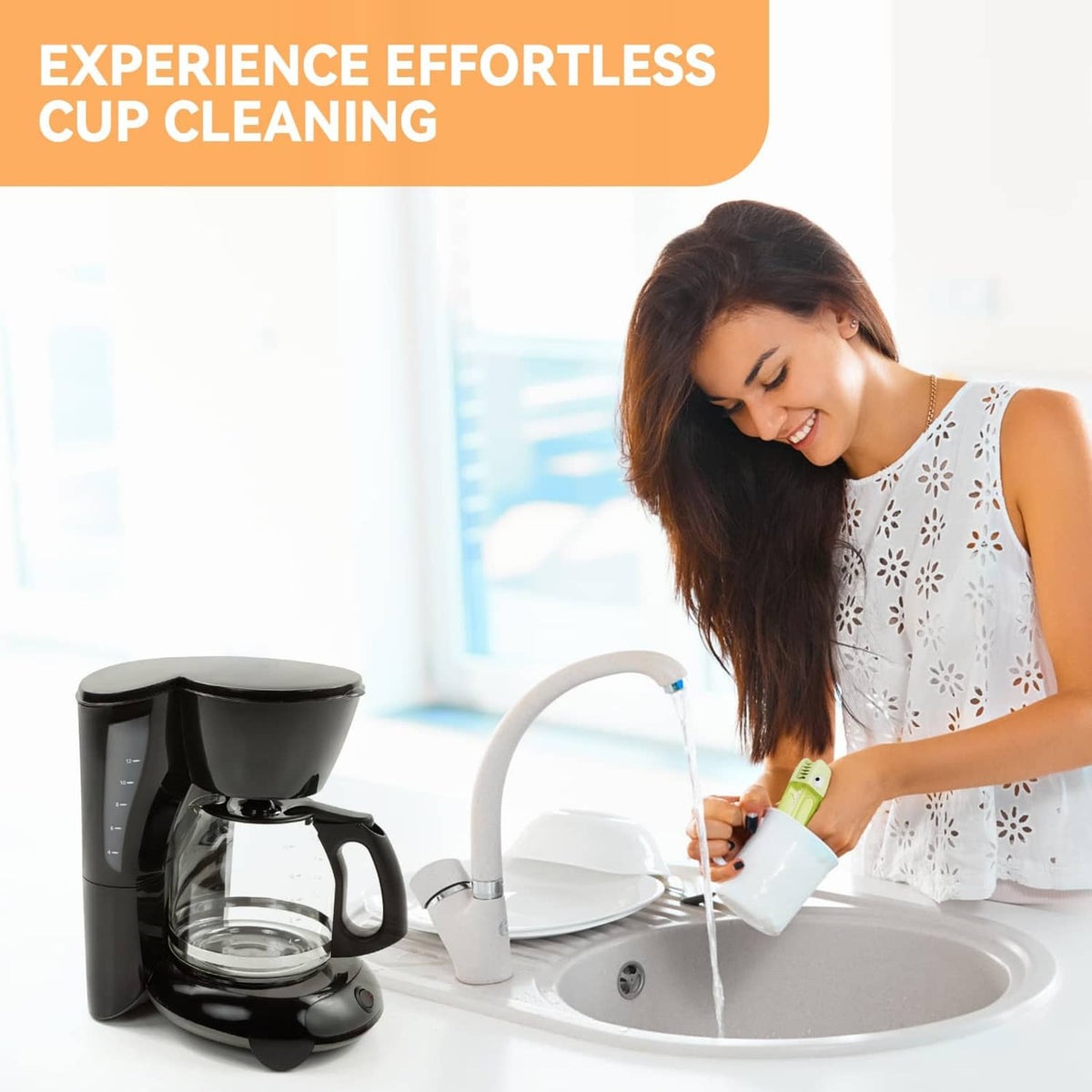 Green cup cleaning brush used near a countertop coffee maker