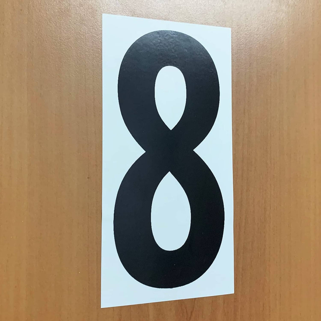 Black vinyl number sticker, large “8” on white backing