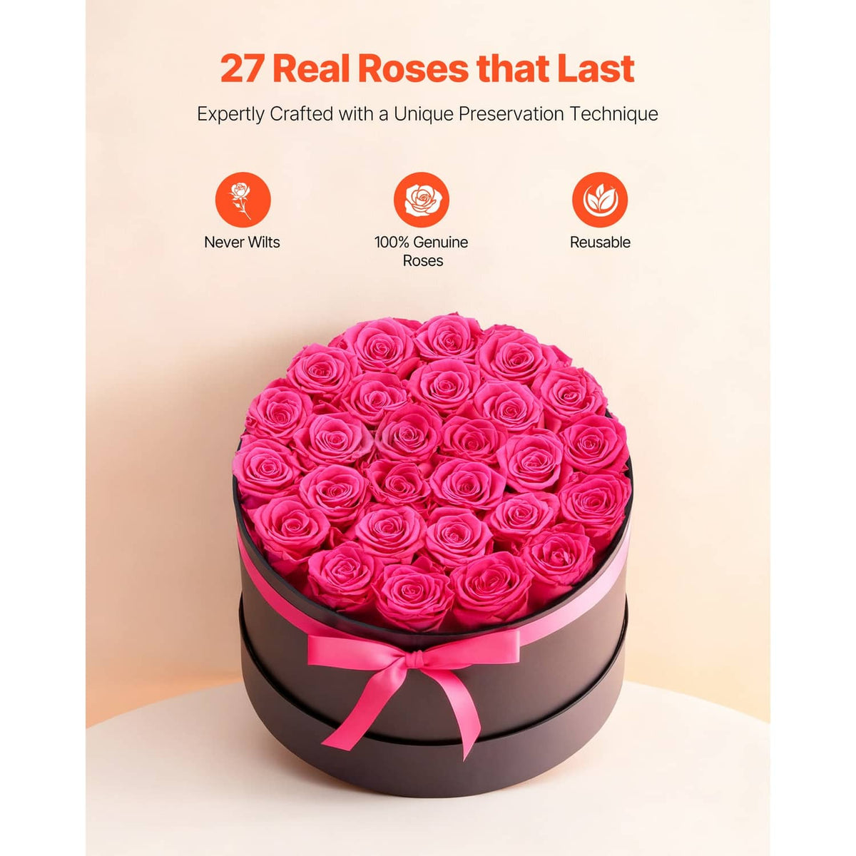 Preserved rose bouquet in black round box with pink ribbon, bright pink roses arranged