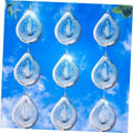 Multiple silver reflective teardrop bird scare discs hanging with bright water-droplet highlights
