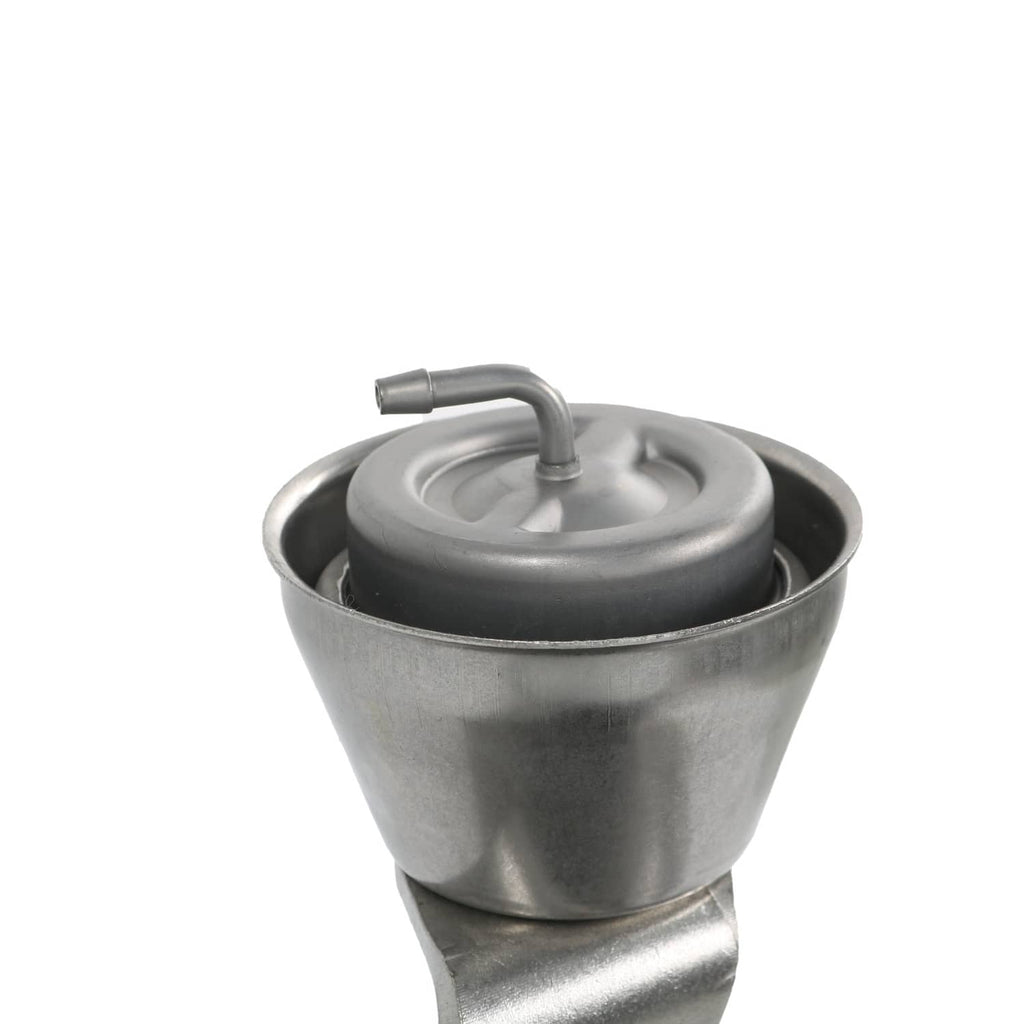 Turbocharger oil return reservoir with metal housing and small hose