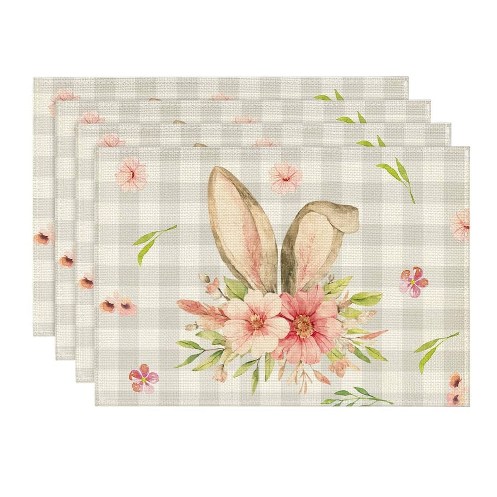Four-pack of rectangular beige plaid bunny-ear floral placemats.