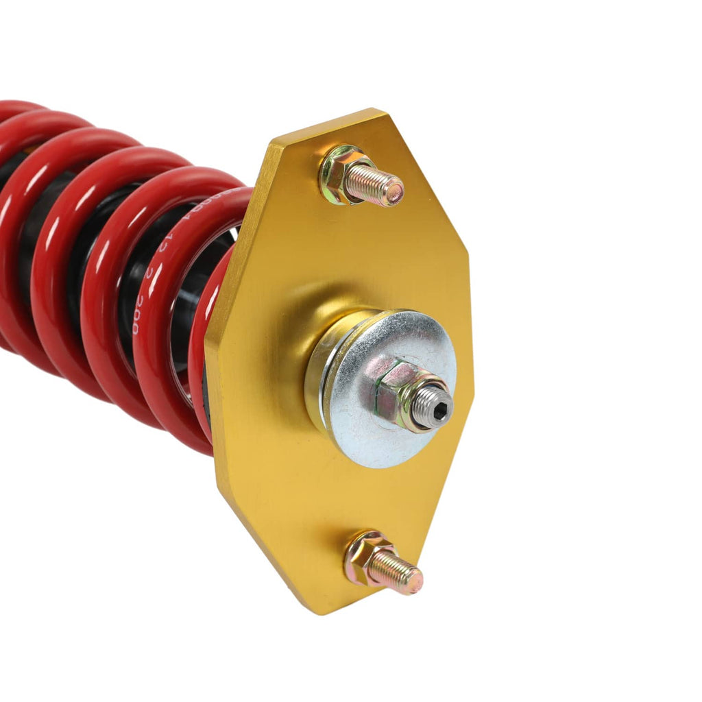 Coilover suspension strut with red spring and gold adjustable mounting plate