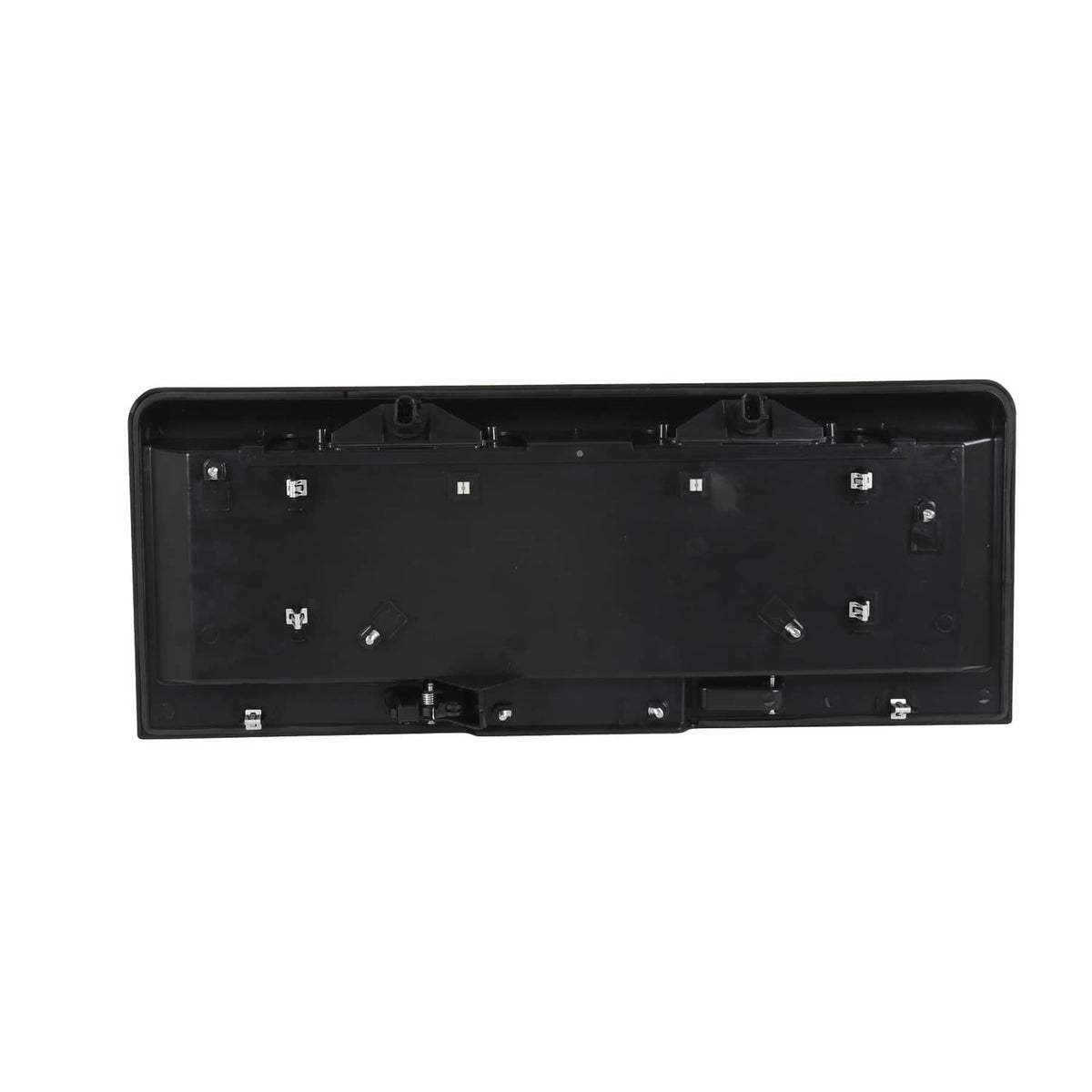 Back side of rear tailgate license pocket with wiring/fastener mounts, black plastic