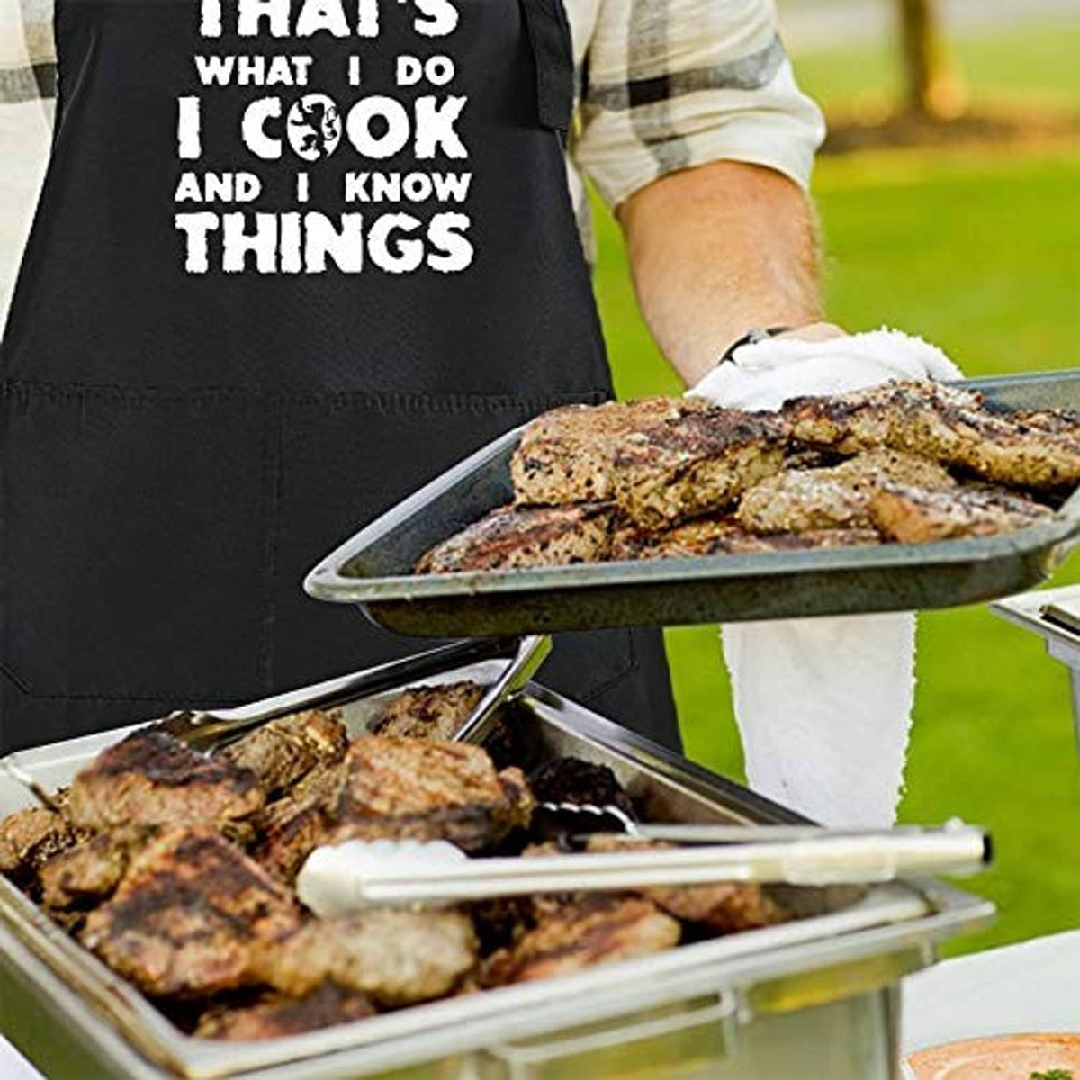 Black chef apron at a grill, showing bold white 'That's what I do...' text
