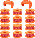 Close-up of stacked orange trimmer line spools with red filament filling