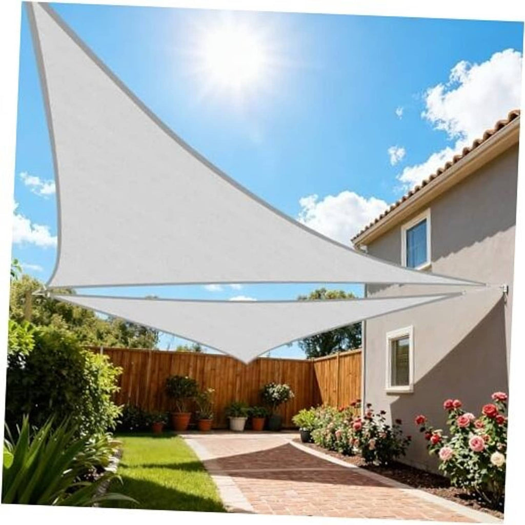 Light grey triangular sun shade sail with curved edge, stretched between posts