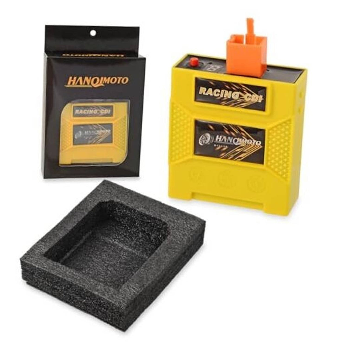 Yellow racing CDI box with orange connector, black retail packaging, and foam insert