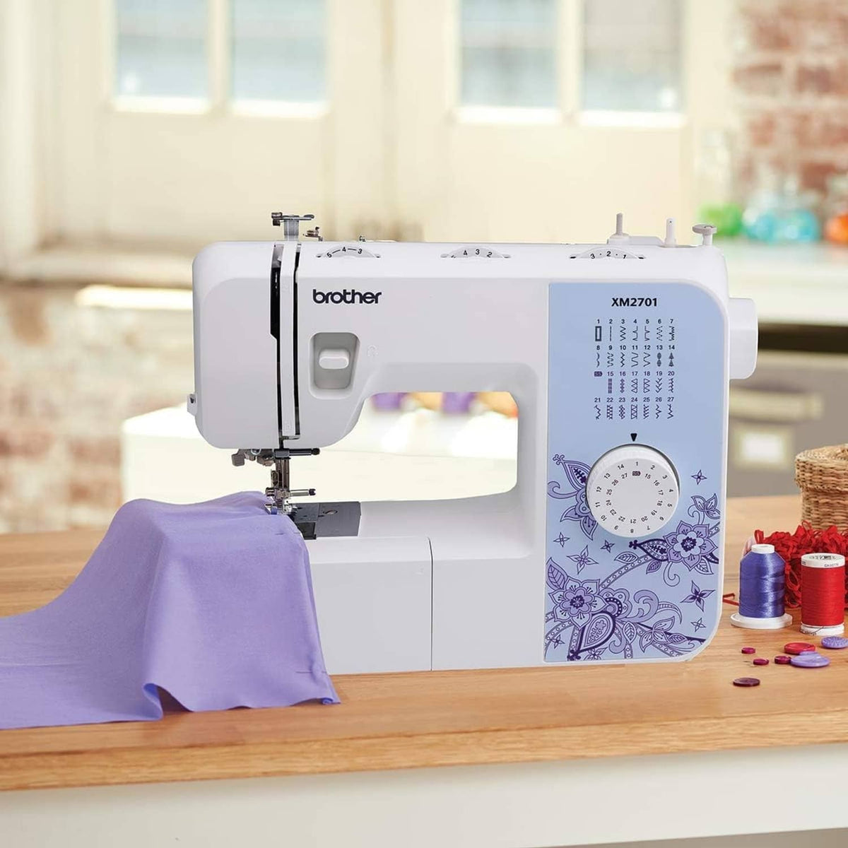 White Brother sewing machine stitching on purple fabric with thread spools