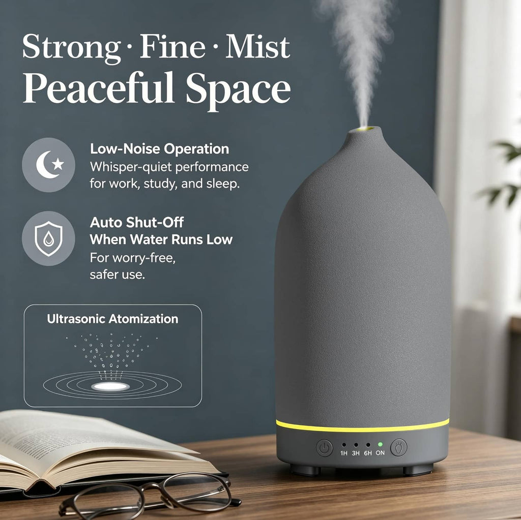 Grey ceramic diffuser releasing fine mist from the top