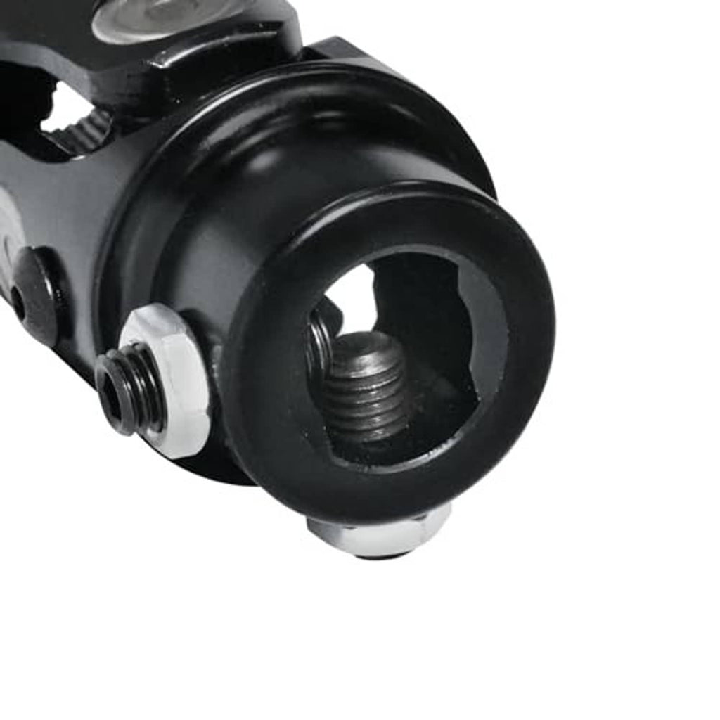 Black steering universal joint close-up of splined shaft end and surrounding housing