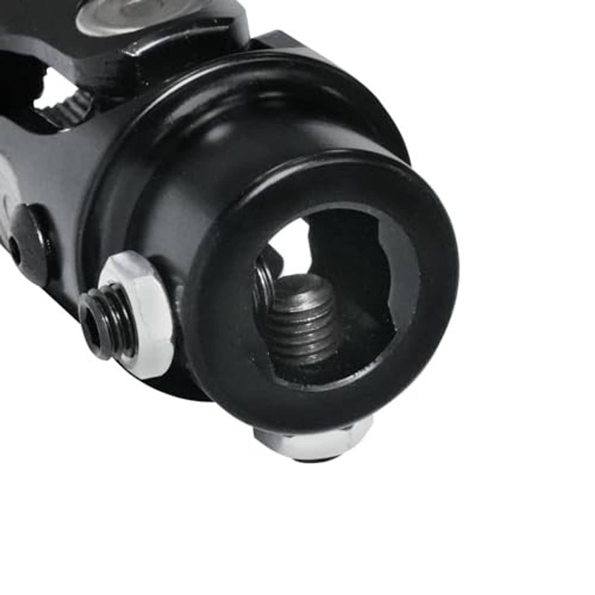 Black steering universal joint close-up of splined shaft end and surrounding housing