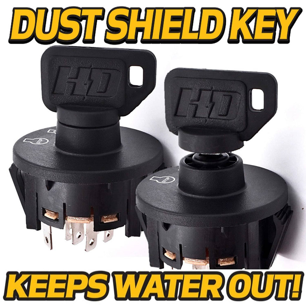 Two black ignition keys with dust-style caps and metal terminals