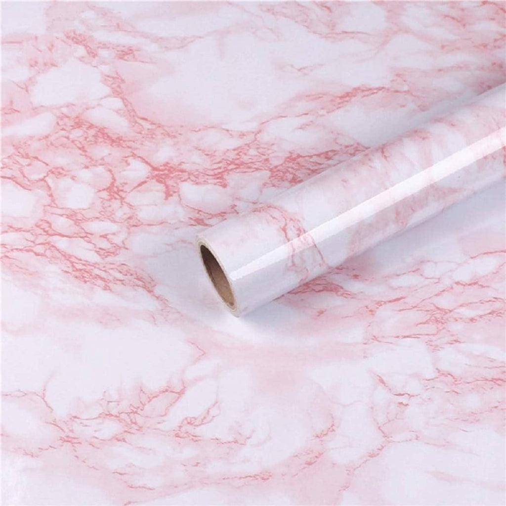Pink and white marble self-adhesive roll film in an angled close-up view