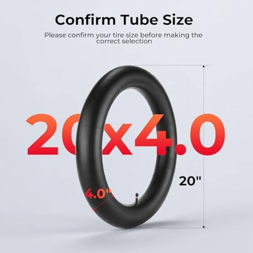 Black fat bike inner tube sized for 20x4.0 tires, with valve stem