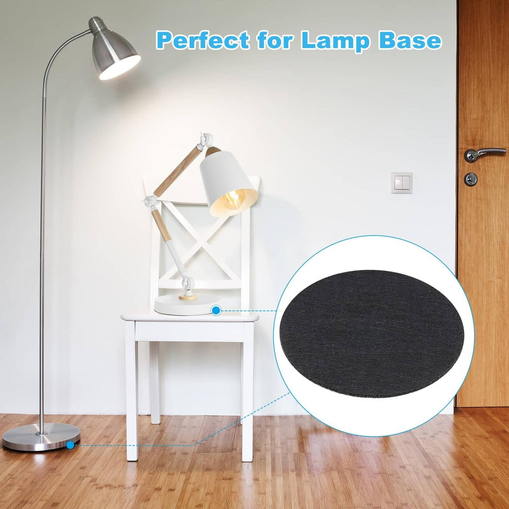 Black felt lamp base pad placed under a lamp stand for protection